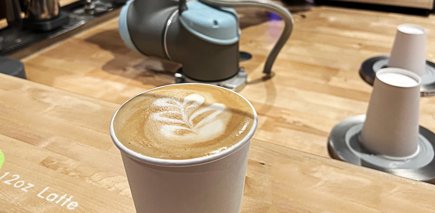 Load video: Various clips of Artly performing his robot barista duties